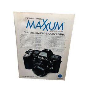 1985 Minolta Maxxum Camera Only Human Eye Can Focus Faster Original Print Ad